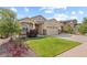 Beautifully landscaped yard complements the inviting exterior of this lovely home at 17956 Gypsum Canyon Ct, Monument, CO 80132