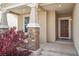Inviting front porch with stone accents and a charming entryway at 17956 Gypsum Canyon Ct, Monument, CO 80132