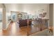 Open-concept living space featuring hardwood floors and modern finishes at 17956 Gypsum Canyon Ct, Monument, CO 80132