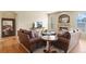 Inviting living room with a stone fireplace, perfect for relaxation at 17956 Gypsum Canyon Ct, Monument, CO 80132