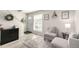 Inviting living room with neutral tones, accent furniture, and stylish decor for a cozy atmosphere at 6450 Tennyson St # 1, Arvada, CO 80003