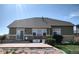 A nice backyard with a concrete patio and green lawn, perfect for outdoor relaxation and entertaining at 581 N Flat Rock Cir, Aurora, CO 80018