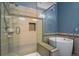 This bathroom features a stand-alone tub, glass shower, and recessed shelves at 581 N Flat Rock Cir, Aurora, CO 80018