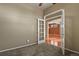 Home office with French doors opening to the living room at 581 N Flat Rock Cir, Aurora, CO 80018