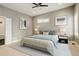 A serene bedroom with plush carpet, ample natural light, and modern decor at 2624 S Race St, Denver, CO 80210