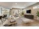 Spacious living room with modern furniture, shuttered windows, and stylish decor at 2624 S Race St, Denver, CO 80210