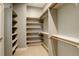 Spacious walk-in closet with built-in shelving and ample storage space at 2624 S Race St, Denver, CO 80210