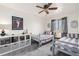 Cozy bedroom with twin beds, stylish decor, and ample storage space at 23813 Broadmoor Dr, Parker, CO 80138