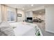 Bright bedroom with a comfortable bed, a work desk, and ample natural light at 23813 Broadmoor Dr, Parker, CO 80138