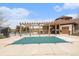 Community pool with cover and pergola and a clubhouse at 23813 Broadmoor Dr, Parker, CO 80138