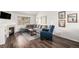 Comfortable living room with fireplace, modern decor, and a cozy atmosphere at 23813 Broadmoor Dr, Parker, CO 80138