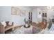 Cozy living room featuring stylish decor, hardwood floors, and an open layout at 865 S Dale Ct, Denver, CO 80219