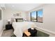 Inviting bedroom with stylish decor, large window, and comfortable furnishings at 1385 N King St, Denver, CO 80204