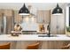 Stylish kitchen with a center island, modern appliances, and sleek finishes at 1385 N King St, Denver, CO 80204