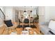 Stylish living space with hardwood floors, modern furnishings, and an open layout to the kitchen at 1385 N King St, Denver, CO 80204