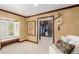 Spacious bedroom with large closet and sitting area at 2209 Green Oaks Ln, Greenwood Village, CO 80121