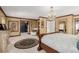 Luxurious main bedroom with walk-in closet and sitting area at 2209 Green Oaks Ln, Greenwood Village, CO 80121