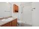 Bathroom features a shower, vanity and mirror with medicine cabinet at 2253 Coronado Pkyn # D, Denver, CO 80229