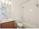 Bathroom featuring a vanity and a shower-tub combo at 2253 Coronado Pkyn # D, Denver, CO 80229