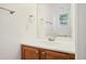 Clean bathroom featuring a modern vanity and a large mirror at 2253 Coronado Pkyn # D, Denver, CO 80229