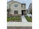 Inviting two-story home with stone accents and a landscaped front yard at 5126 Buckwheat Rd, Brighton, CO 80640