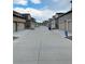 A wide street lined with charming homes showcases the community's well-maintained and welcoming atmosphere at 5126 Buckwheat Rd, Brighton, CO 80640