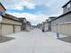 A neatly kept street with attractive homes, highlighting the community's curb appeal and inviting atmosphere at 5126 Buckwheat Rd, Brighton, CO 80640
