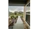 Inviting view of the community park from the porch, with flowers, greenery and seating at 5126 Buckwheat Rd, Brighton, CO 80640