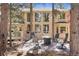 Backyard featuring a wooden deck, an outdoor seating area, and a wall of windows on the house at 20050 Lost Arrowhead Dr, Monument, CO 80132