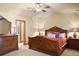 Bright bedroom featuring a bed, carpeted floor, a ceiling fan and a window with natural light at 20050 Lost Arrowhead Dr, Monument, CO 80132