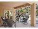 Relaxing covered deck with outdoor seating for entertaining at 20050 Lost Arrowhead Dr, Monument, CO 80132