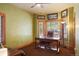 Home office with wood trim, natural light, and built-in shelving at 20050 Lost Arrowhead Dr, Monument, CO 80132