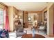 Beautiful living room with large windows, elegant decor, and comfortable furnishings at 20050 Lost Arrowhead Dr, Monument, CO 80132