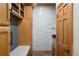Mud room featuring built-in storage, and tile flooring at 20050 Lost Arrowhead Dr, Monument, CO 80132
