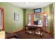 Inviting office space with wood trim, large windows, and ample natural light perfect for productivity at 20050 Lost Arrowhead Dr, Monument, CO 80132