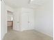 Carpeted bedroom includes a ceiling fan, closet, and easy access to other rooms at 134 Laramie Ct, Castle Rock, CO 80104