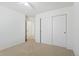 This bedroom features neutral carpet, closet and a ceiling fan at 134 Laramie Ct, Castle Rock, CO 80104