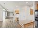 Open concept living space featuring wood floors, neutral walls, built-in shelves, and a fireplace at 134 Laramie Ct, Castle Rock, CO 80104