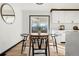 Cozy dining area with a round table and chairs, near the kitchen at 355 S Monaco Pkwy, Denver, CO 80224