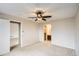 Spacious bedroom with ensuite bathroom and a doorway to another bedroom at 7661 Gray Way, Arvada, CO 80003
