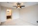 Main bedroom with ensuite bathroom featuring a ceiling fan at 7661 Gray Way, Arvada, CO 80003