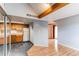View of the kitchen featuring classic cabinetry, white refrigerator, and tile flooring at 12480 W Nevada Pl # 214, Lakewood, CO 80228