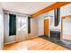 Inviting living room featuring a fireplace, wood beam, and window with view at 12480 W Nevada Pl # 214, Lakewood, CO 80228