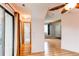 Bright living room featuring hardwood floors and natural light throughout the open floor plan at 12480 W Nevada Pl # 214, Lakewood, CO 80228