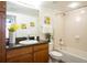 Bathroom features a granite countertop, decorative mirrors, and bath tub at 1950 N Logan St # 102, Denver, CO 80203