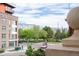 Apartment complex exterior overlooking a park at 1950 N Logan St # 102, Denver, CO 80203