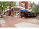 The exterior of Xiquita Restaurant featuring outdoor seating and a vibrant setting at 1950 N Logan St # 102, Denver, CO 80203