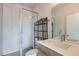Modern bathroom with walk-in shower, sleek fixtures, and contemporary vanity at 3520 W Conejos Pl # 11, Denver, CO 80204