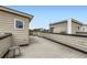 Private rooftop deck area offering additional space and views of the surrounding community at 3520 W Conejos Pl # 11, Denver, CO 80204