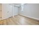Basement bedroom with neutral flooring, closet, white walls and a window offering natural light at 50 Yarrow St, Lakewood, CO 80226